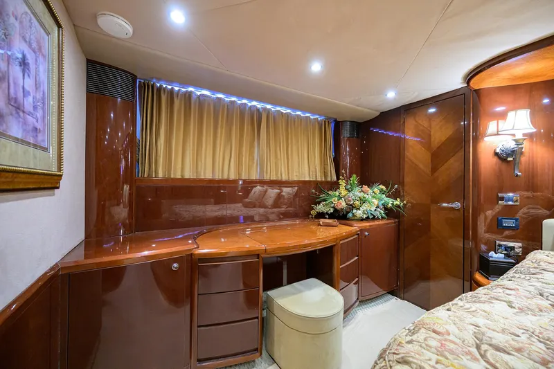 Slide: The Image of Luxurious cabin interior of 2006 Viking Princess Sport Cruisers with elegant wood finish. - 34