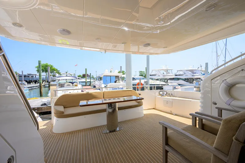 Slide: The Image of Luxury 2006 Viking Princess Sport Cruiser yacht interior with dock view. - 4