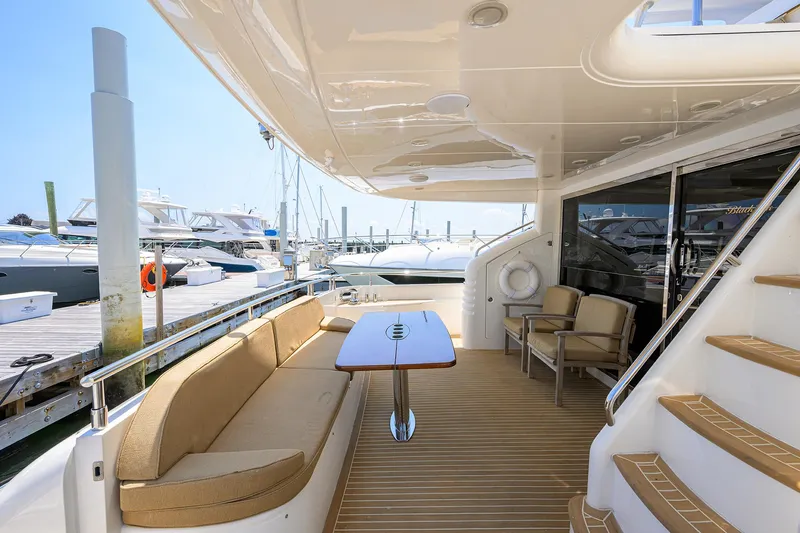Slide: The Image of Luxurious 2006 Viking Princess Sport Cruisers yacht with elegant seating and polished deck. - 5