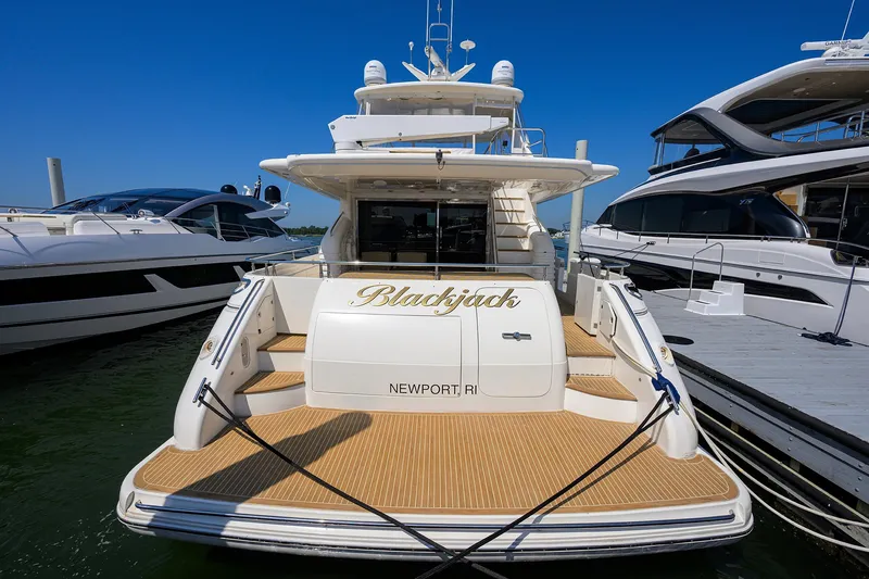 Slide: The Image of 2006 Viking Princess Sport Cruiser yacht docked, named "Blackjack," in Newport, RI. - 6