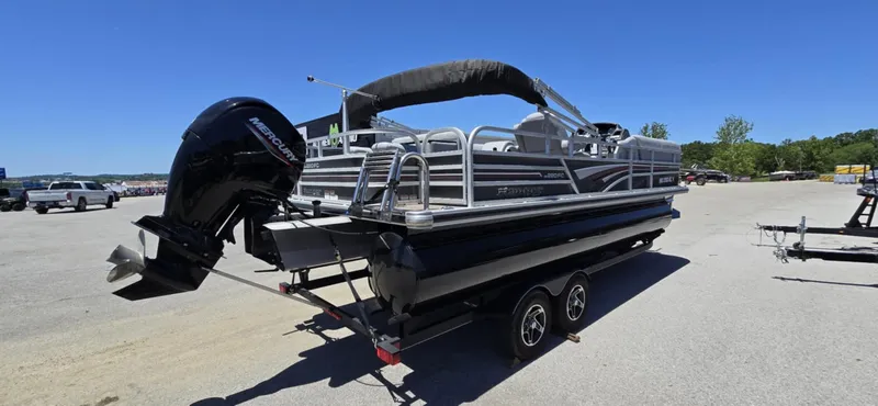 Slide: The Image of 2020 Ranger Reata 220FC pontoon boat with outboard motor on a trailer. - 3