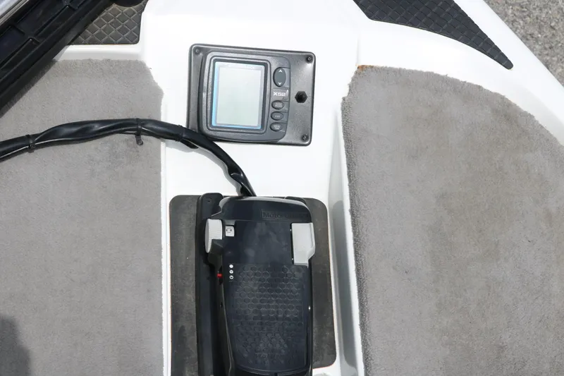 Slide: The Image of Control panel and foot pedal on 2009 Triton 17 Explorer boat. - 20