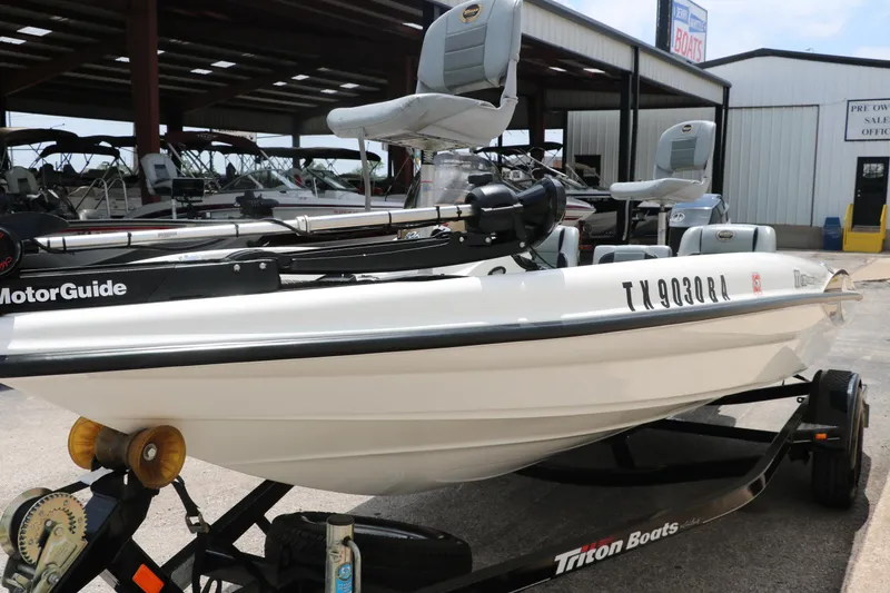 Slide: The Image of 2009 Triton 17 Explorer boat on trailer, equipped with MotorGuide. - 4