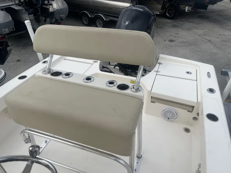 Slide: The Image of Boat interior with beige seating and rod holders, Pathfinder 2005 TRS, 2022 model. - 10