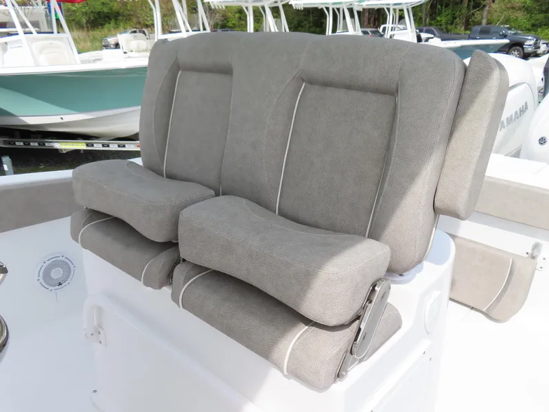 Slide: The Image of 2025 Sea Hunt Gamefish 25 boat seating with gray cushioned seats. - 23