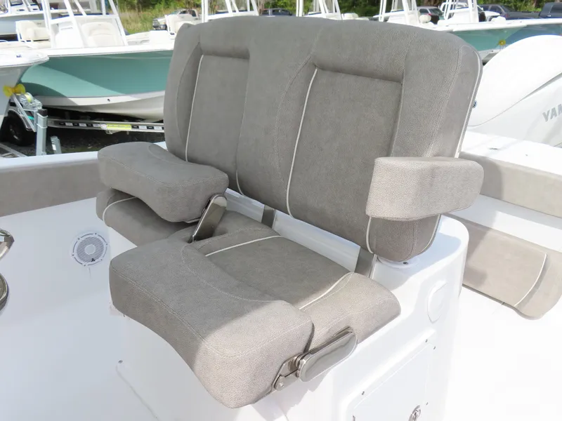 Slide: The Image of 2025 Sea Hunt Gamefish 25 boat seating with cushioned armrests and backrest. - 24
