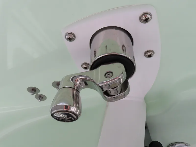 Slide: The Image of Close-up of a 2025 Sea Hunt Gamefish 25 boat fixture, featuring a chrome handle. - 29