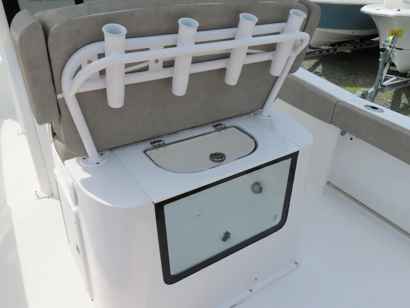 Slide: The Image of 2025 Sea Hunt Gamefish 25 boat with rod holders and storage compartment. - 35