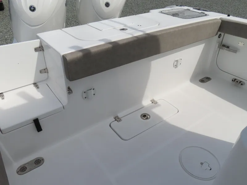 Slide: The Image of 2025 Sea Hunt Gamefish 25 boat interior with seating and storage compartments. - 39