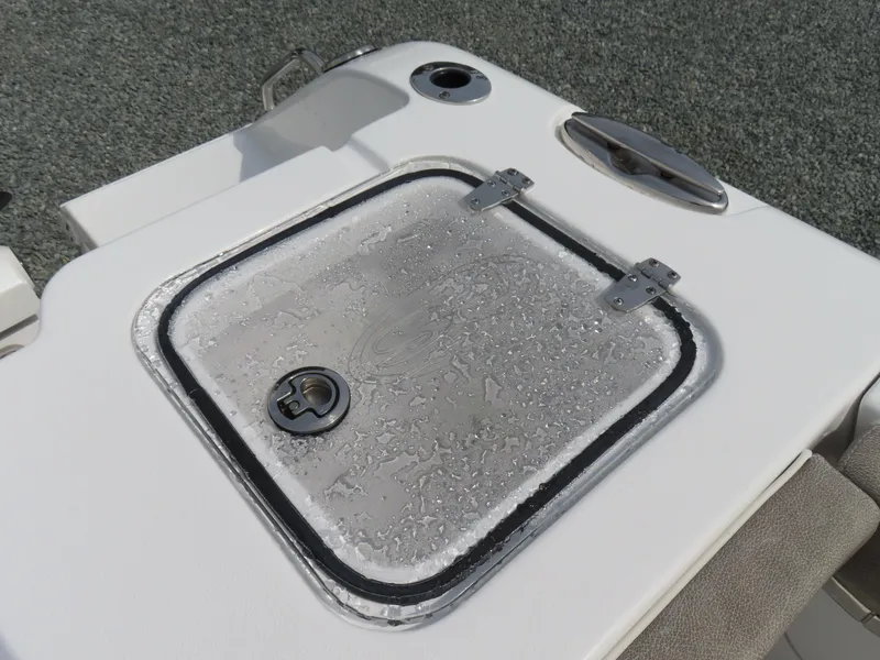 Slide: The Image of 2025 Sea Hunt Gamefish 25 boat hatch with water droplets on the lid. - 43
