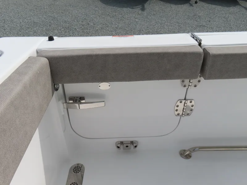 Slide: The Image of 2025 Sea Hunt Gamefish 25 boat interior, featuring cushioned seating and stainless steel hardware. - 45