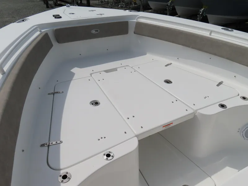 Slide: The Image of 2025 Sea Hunt Gamefish 25 boat deck with spacious seating and storage compartments. - 9