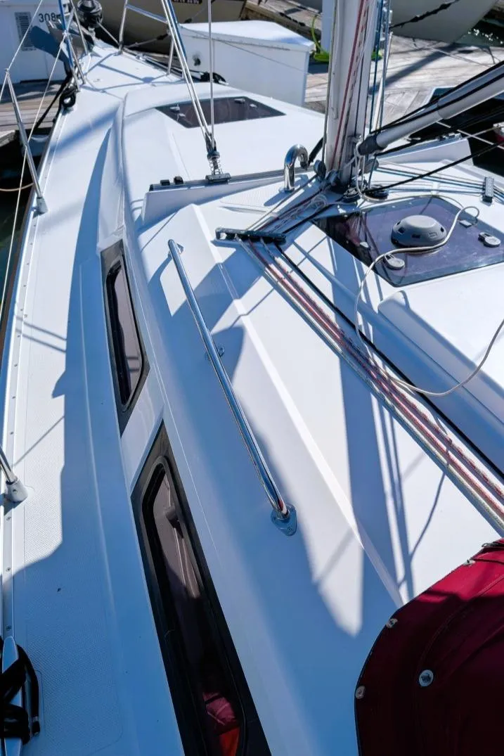 Slide: The Image of 2014 Hanse 325 sailboat deck with sleek design and modern fittings. - 27