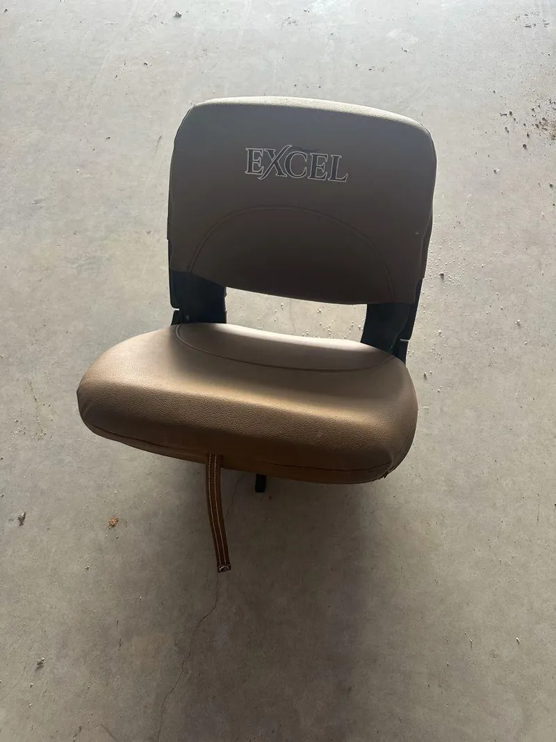 Slide: The Image of Boat seat from 2025 Excel 1860 F4 Shallow Water Pro Console, brown upholstery. - 7