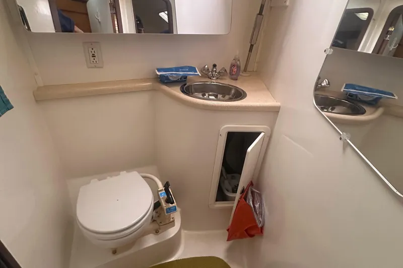 Slide: The Image of Bathroom interior of a 1998 Catalina 400 yacht with sink and toilet. - 38