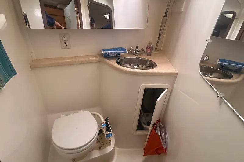 Slide: The Image of Compact bathroom in a 1998 Catalina 400 yacht with sink and toilet. - 39