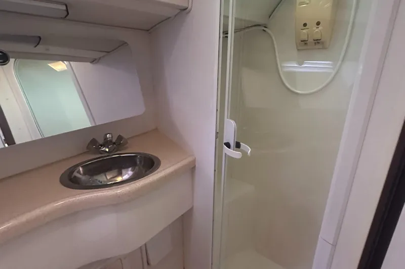 Slide: The Image of Bathroom interior of a 1998 Catalina 400 yacht with sink and shower. - 50