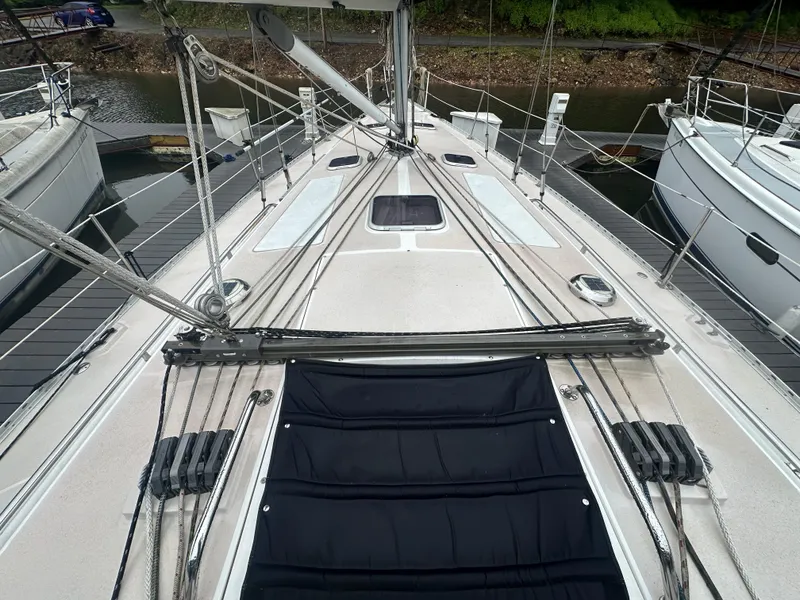 Slide: The Image of Deck view of a 1998 Catalina 400 sailboat, showcasing rigging and hatch details. - 9