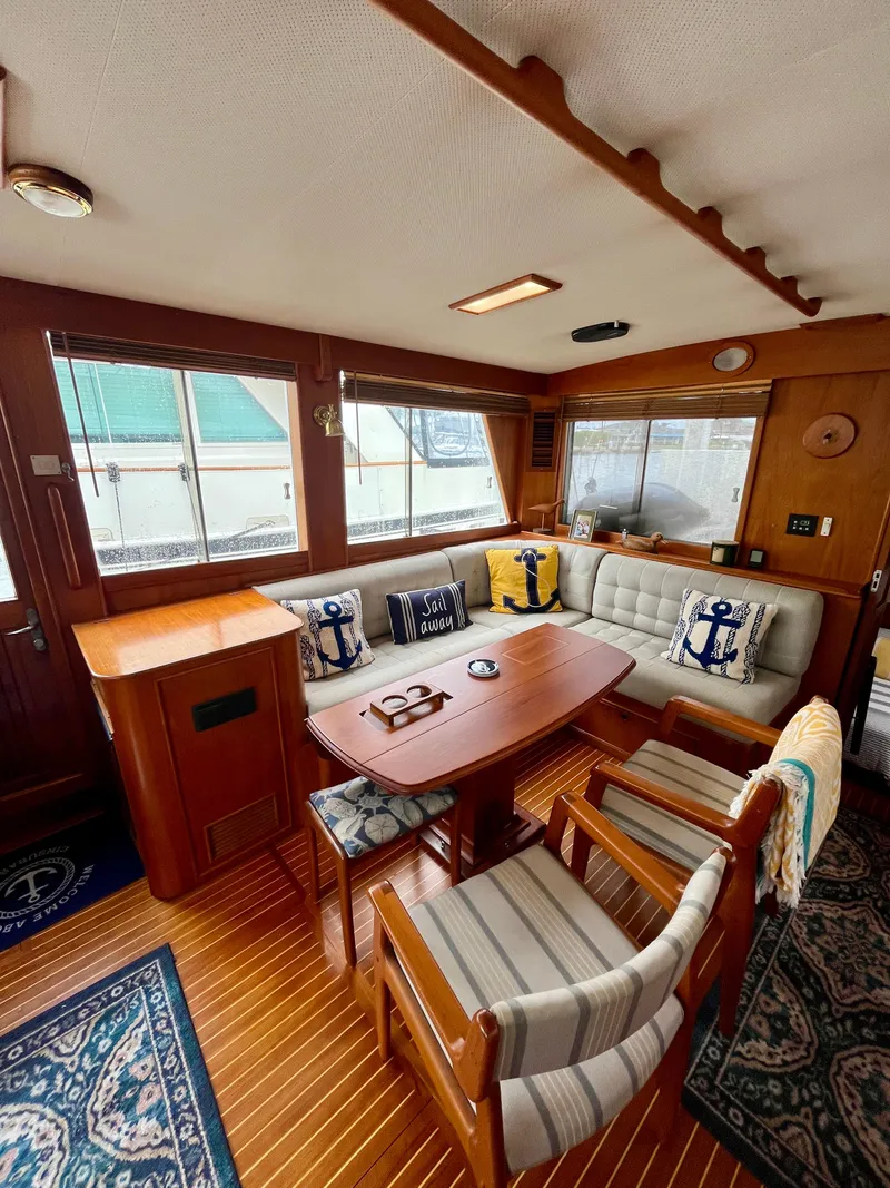Slide: The Image of Interior of a 1997 Grand Banks 49 Classic yacht with wooden furnishings and nautical decor. - 11