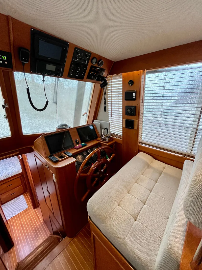 Slide: The Image of Interior of 1997 Grand Banks 49 Classic yacht with wooden helm and navigation equipment. - 22