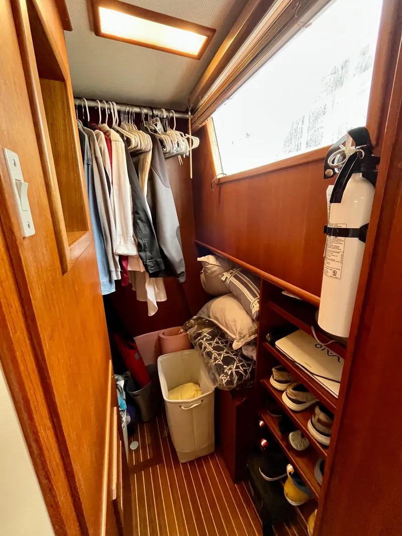 Slide: The Image of Cozy closet space in 1997 Grand Banks 49 Classic yacht with clothes and storage. - 39