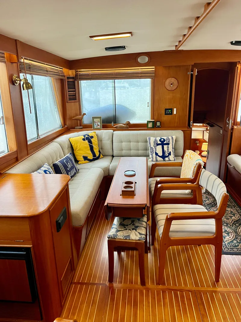 Slide: The Image of Interior of a 1997 Grand Banks 49 Classic yacht with elegant wood finish and nautical decor. - 9