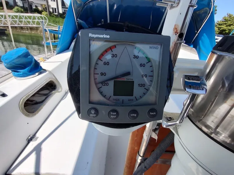 Slide: The Image of Wind gauge on 1987 Catalina C-34 sailboat, displaying wind speed and direction. - 16