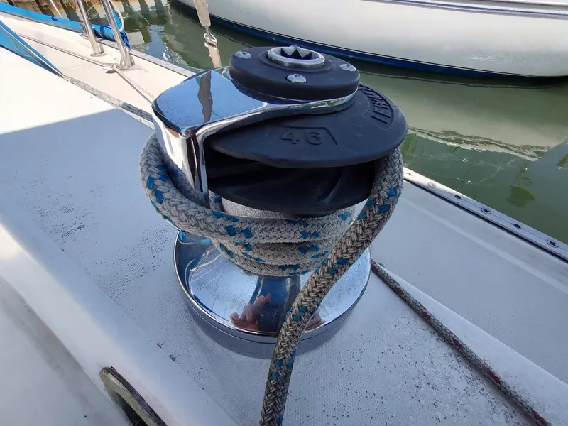 Slide: The Image of Winch with rope on 1987 Catalina C-34 sailboat deck. - 24
