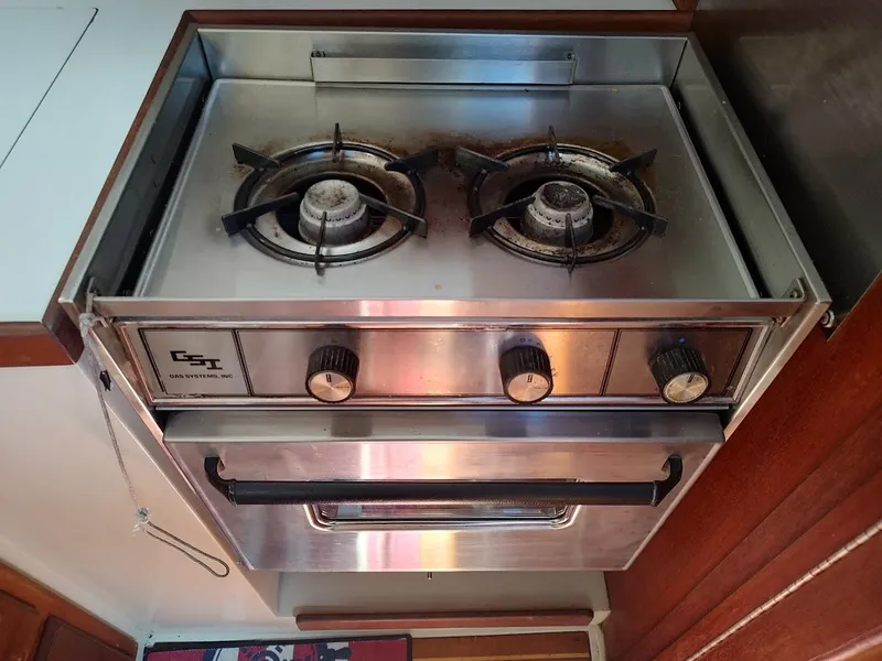 Slide: The Image of Two-burner gas stove in a 1987 Catalina C-34 yacht kitchen. - 37