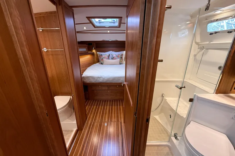 Slide: The Image of Luxurious interior of 2026 Sabre 45 Salon Express yacht with wood finish and modern amenities. - 25