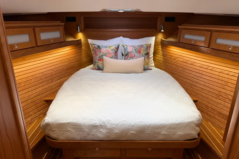 Slide: The Image of Luxurious cabin interior of 2026 Sabre 45 Salon Express yacht with cozy bedding. - 27
