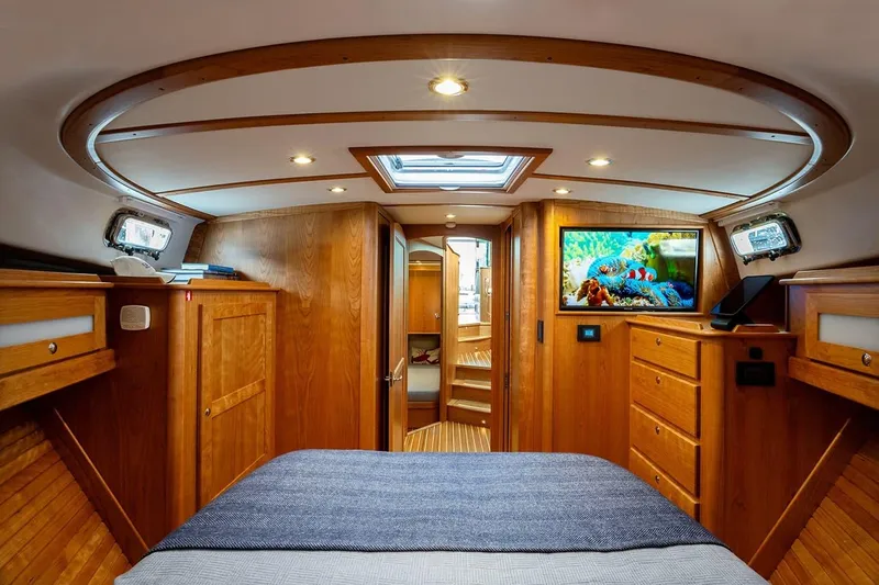 Slide: The Image of Luxurious interior of 2026 Sabre 45 Salon Express yacht with wood finish and modern amenities. - 28
