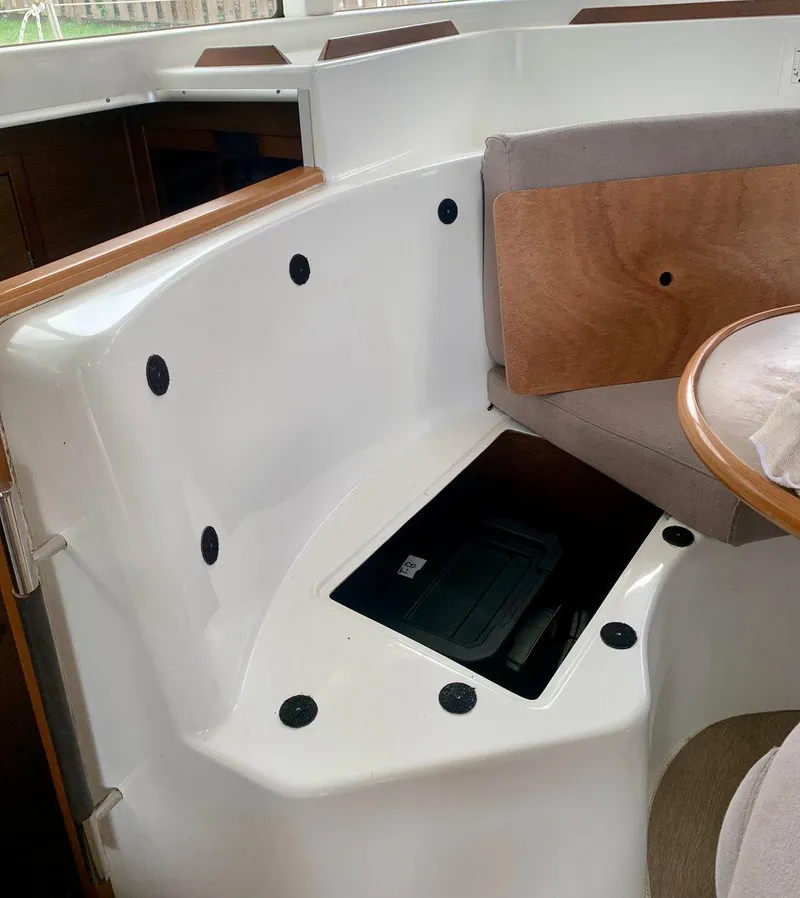 Slide: The Image of Interior of 2019 Lagoon 380 S2 4/2 catamaran with seating and storage. - 35