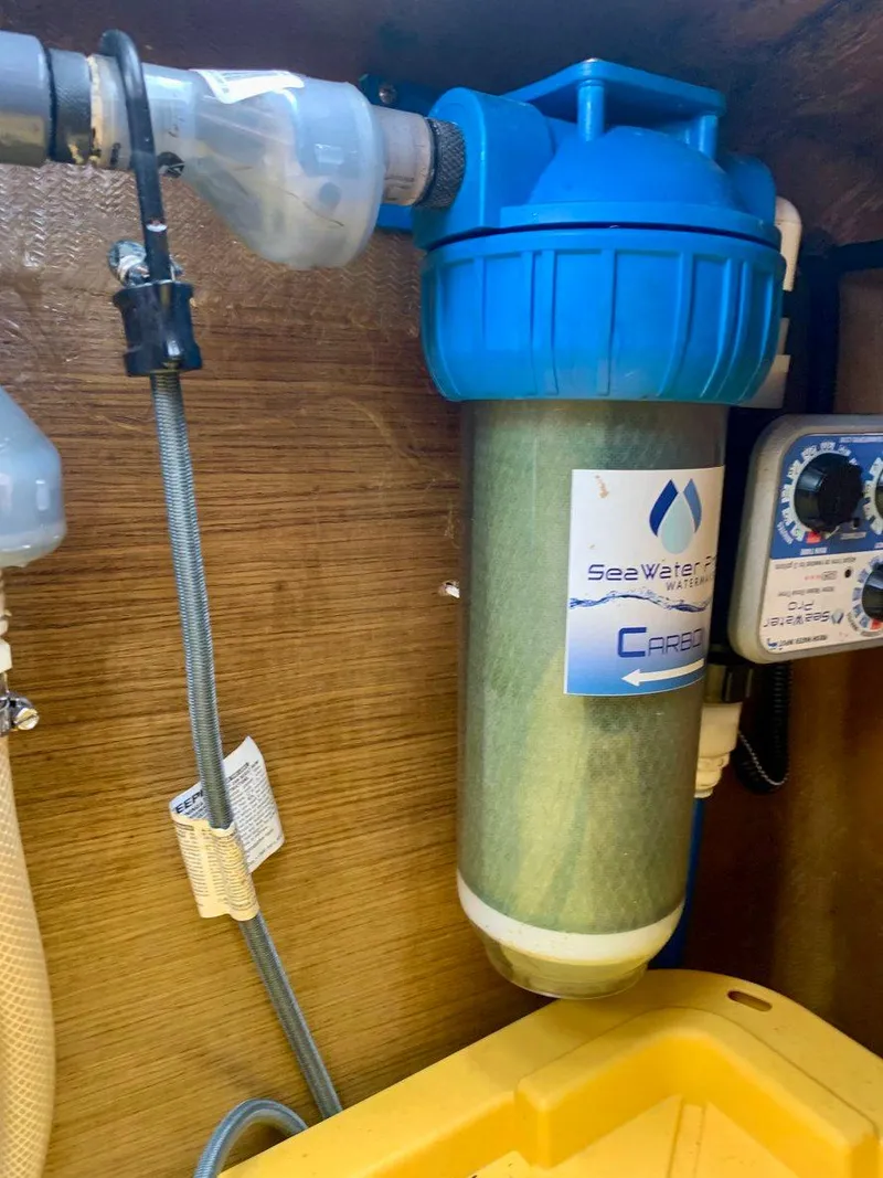 Slide: The Image of Water filtration system in a 2019 Lagoon 380 S2 4/2 yacht. - 42