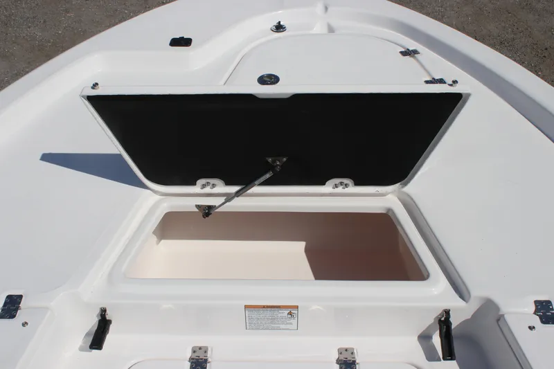 Slide: The Image of Open storage compartment on 2025 Sea Fox 251 Bay Fox boat. - 16