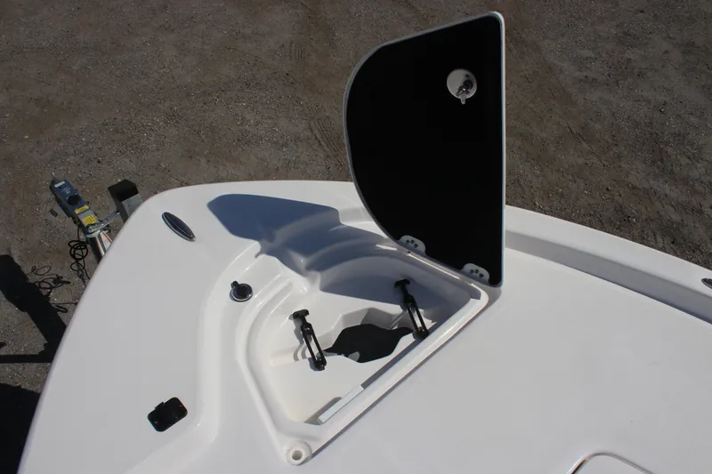 Slide: The Image of 2025 Sea Fox 251 Bay Fox boat with open storage compartment on deck. - 21