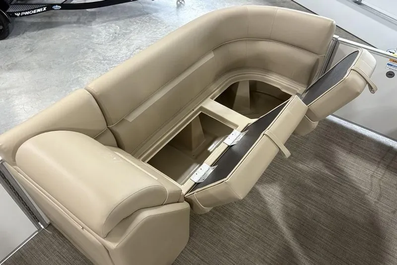 Slide: The Image of Beige seating with storage on 2025 Godfrey Xperience 2286 SBX Sport Tube boat. - 10
