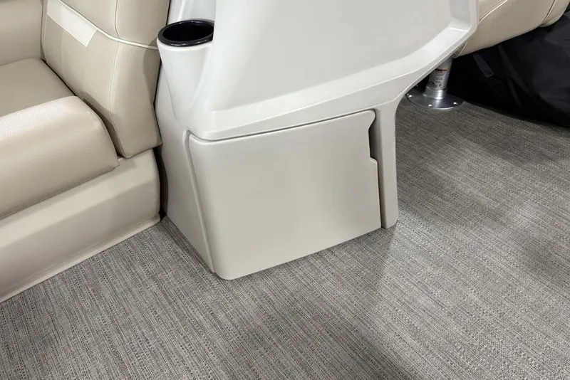 Slide: The Image of Interior of 2025 Godfrey Xperience 2286 SBX Sport Tube, featuring beige seating and flooring. - 13