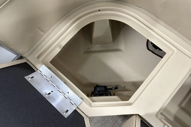 Slide: The Image of Storage compartment of 2025 Godfrey Xperience 2286 SBX Sport Tube boat, open lid view. - 28