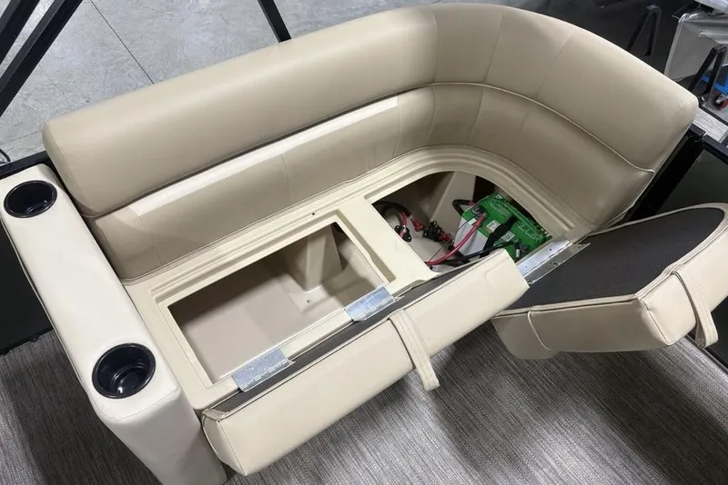Slide: The Image of 2025 Godfrey Xperience 2286 SBX boat seat with storage and cup holders. - 14