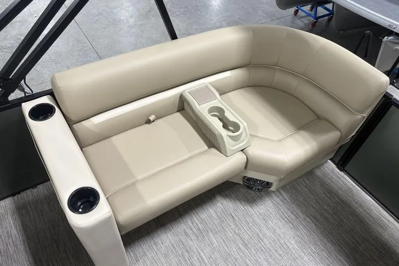 Slide: The Image of 2025 Godfrey Xperience 2286 SBX boat seating with cup holders and beige upholstery. - 19