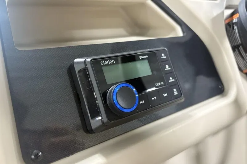 Slide: The Image of Clarion Bluetooth stereo system in 2025 Godfrey Xperience 2286 SBX boat. - 2
