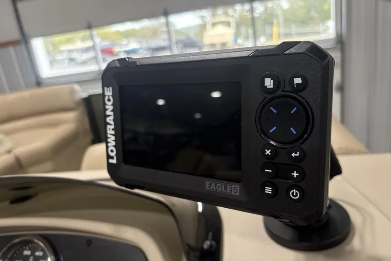Slide: The Image of Lowrance Eagle 5 fish finder on 2025 Godfrey Xperience 2286 SBX boat dashboard. - 3