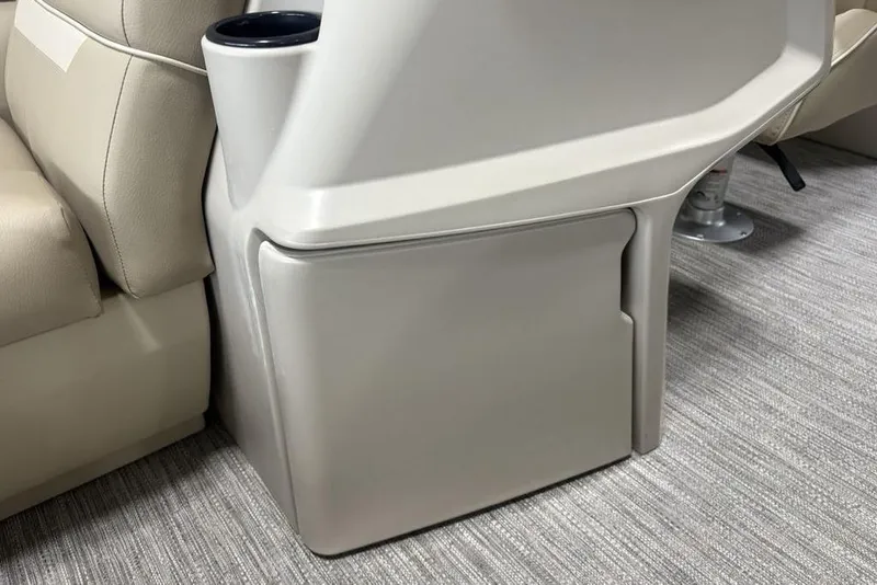 Slide: The Image of 2025 Godfrey Xperience 2286 SBX interior detail with beige seating and integrated cup holder. - 30