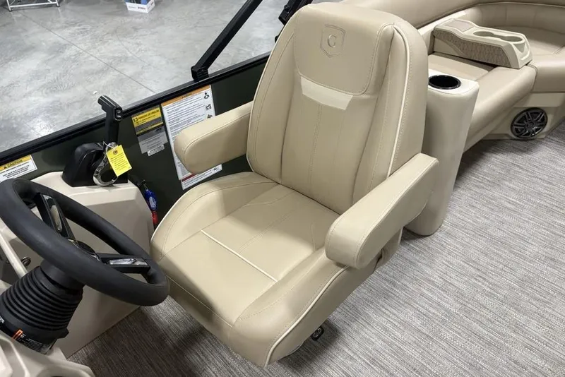 Slide: The Image of Captain's chair in 2025 Godfrey Xperience 2286 SBX pontoon boat, beige upholstery. - 8