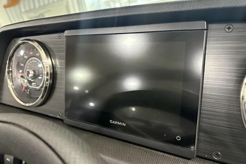 Slide: The Image of Dashboard of 2025 Godfrey Sweetwater 2286 SFL with Garmin display and speedometer. - 22