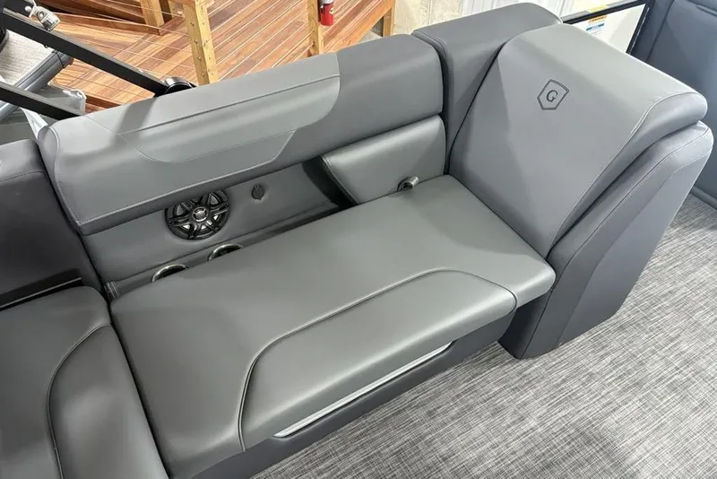 Slide: The Image of Luxurious seating on 2025 Godfrey Sweetwater 2286 SFL pontoon boat, featuring sleek gray upholstery. - 32