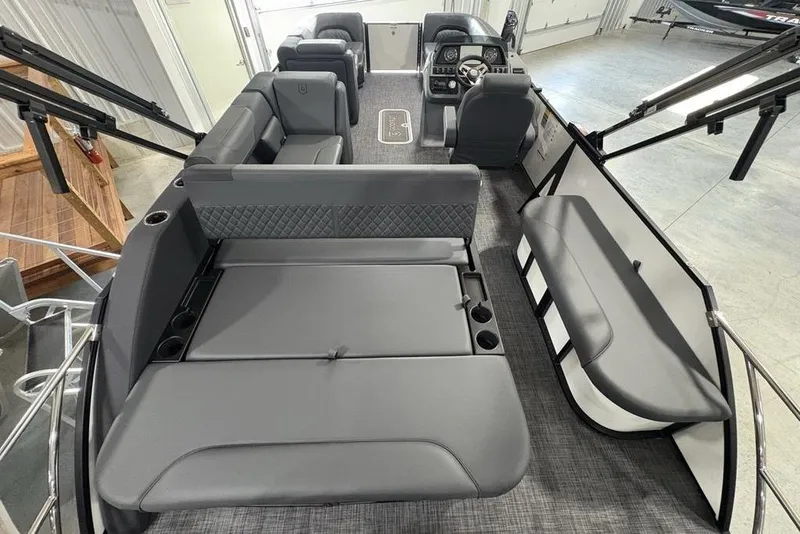 Slide: The Image of 2025 Godfrey Sweetwater 2286 SFL pontoon boat interior with luxurious seating and modern design. - 34