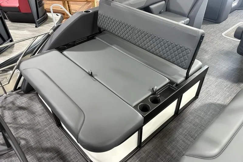 Slide: The Image of 2025 Godfrey Sweetwater 2286 SFL boat seating with gray upholstery and cup holders. - 35