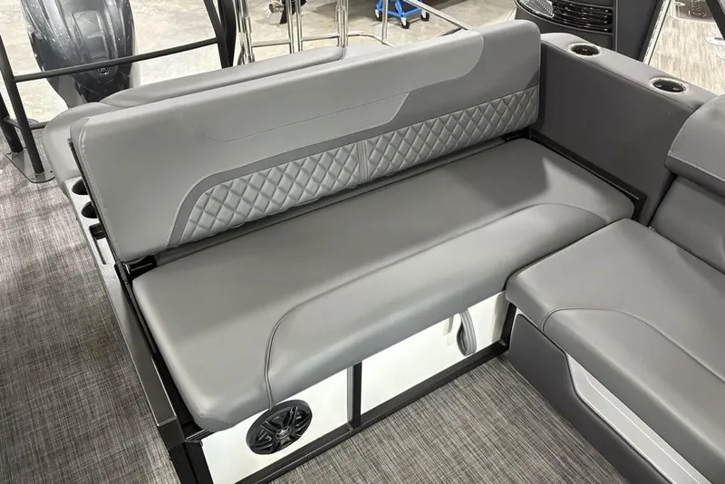 Slide: The Image of 2025 Godfrey Sweetwater 2286 SFL boat interior with gray cushioned seating. - 36